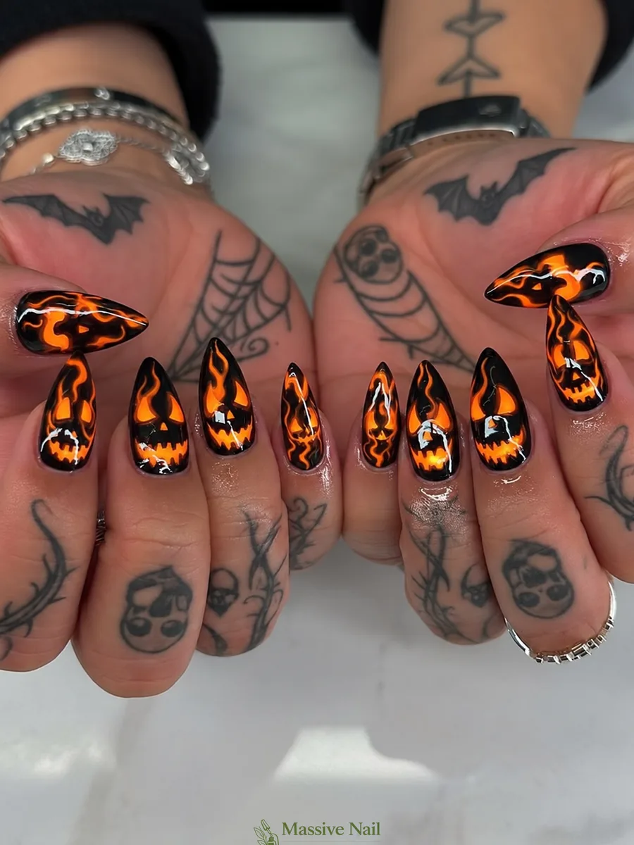 Hand-painted Halloween pumpkin nails