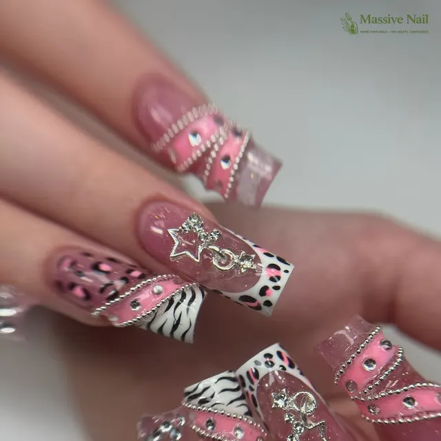 Pink zebra and leopard nails with silver charms