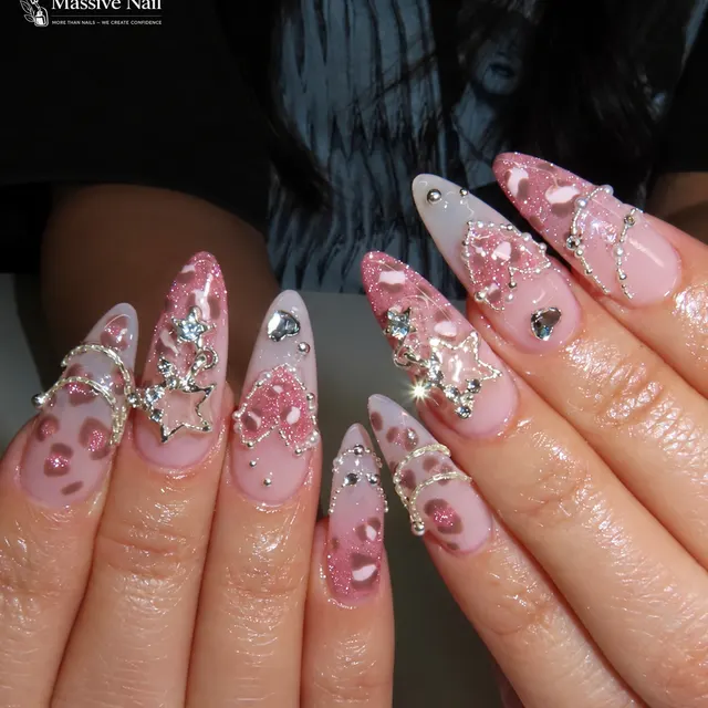 Pink glitter leopard nail design